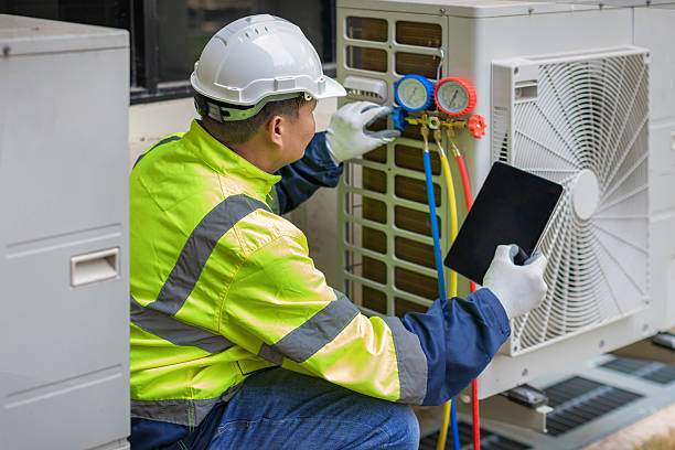 Professional Hvac technician working in Smithville, NJ